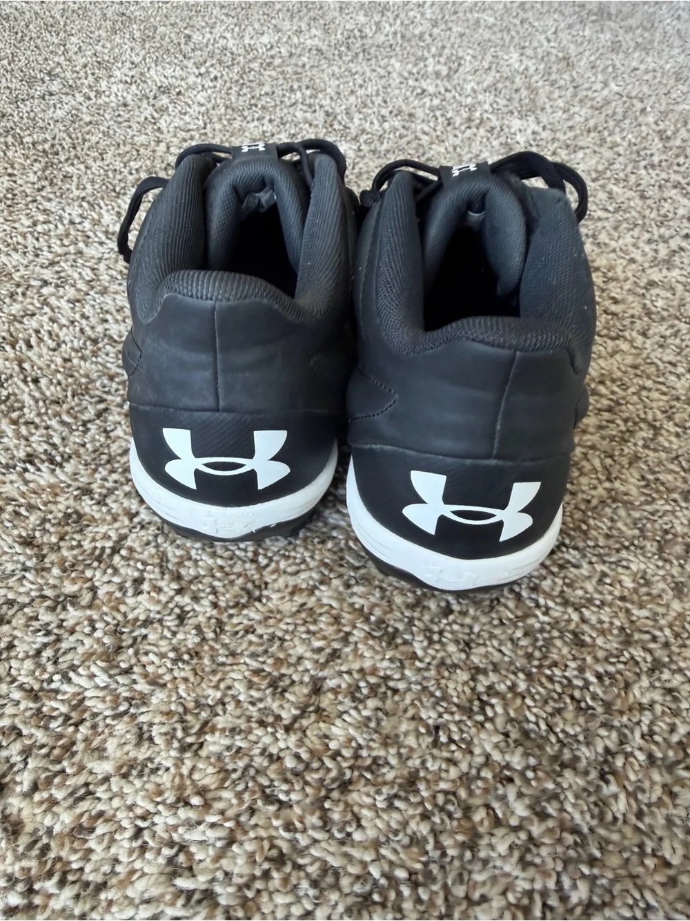 Under Armour Black Cleats with White Soles